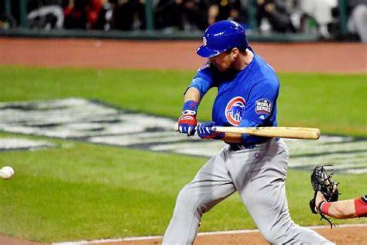 Chicago Cubs outfielder Ben Zobrist (18) celebrates after hitting a RBI double against the Cleveland Indians in the 10th inning in Game 7 of the 2016 World Series at Progressive Field. Photo by Charles LeClaire/USA TODAY Sports