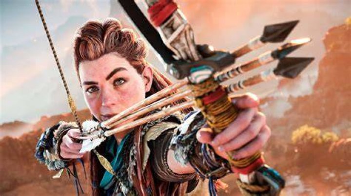 Horizon Forbidden West Aloy aiming her Nora Elite Bow angrily at enemy machines and rebels