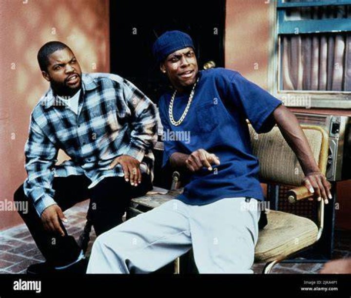 Ice Cube and Chris Tucker look on, mouths agape, in ‘Friday’
