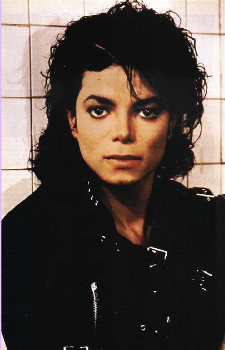 Michael Jackson in front of a wall