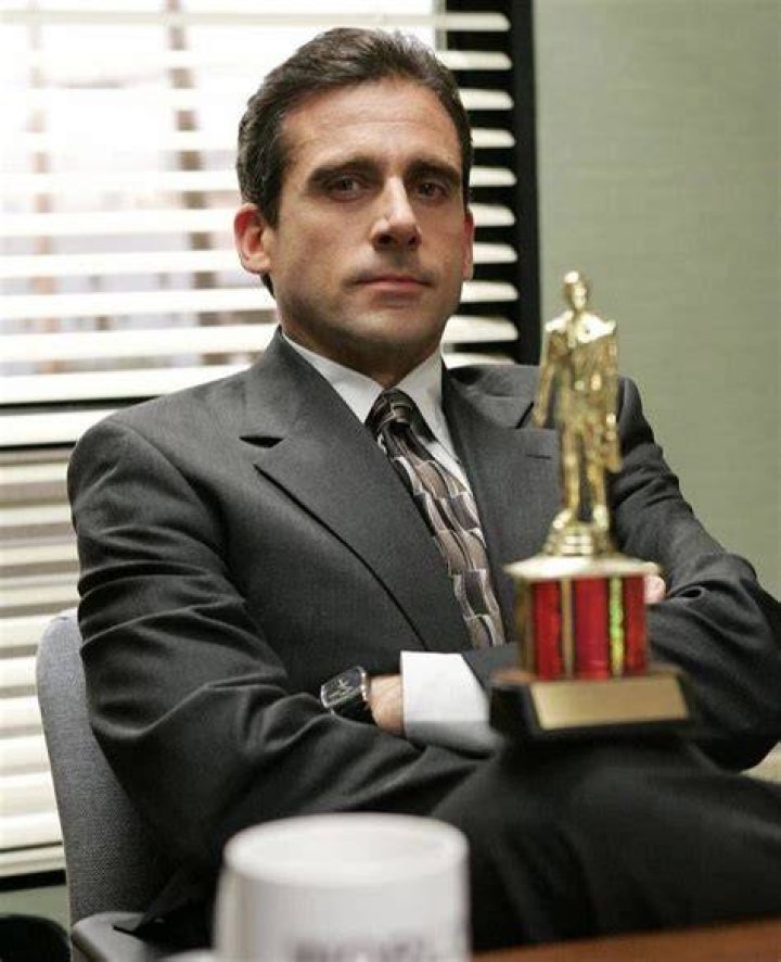 Michael Scott with a trophy