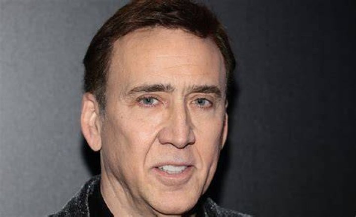 Nicolas Cage holds the rocket in The Rock