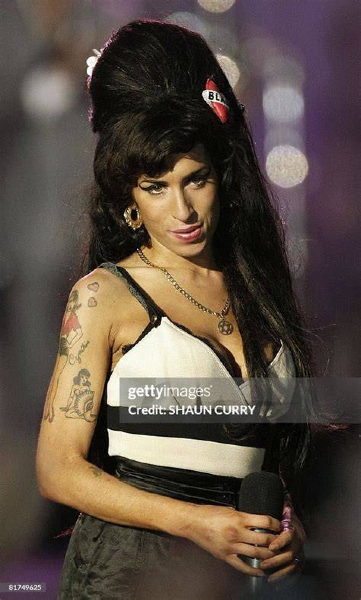 Singer Amy Winehouse performs during a 46664 concert celebrating Nelson Mandela's life at Hyde Park on June 27, 2008, in London, England.
