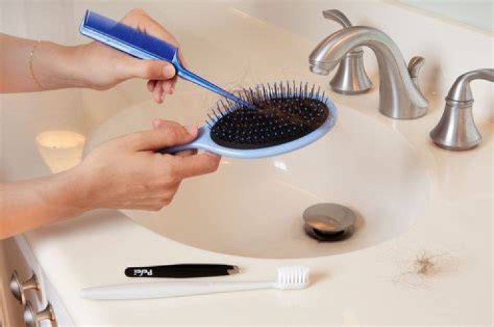 To clean a typical hairbrush, one must pluck the hair from between the bristles. Photo by Alexis Noel/Georgia Institute of Technology