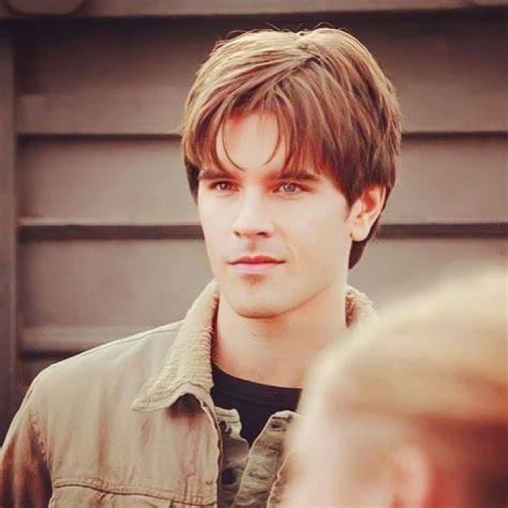 Ty Borden sits at a desk in the TV show 'Heartland'