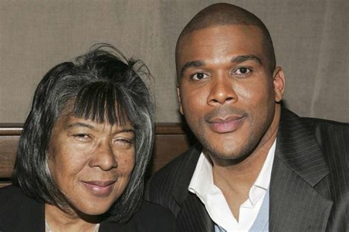 Tyler Perry poses with his hardware in press room at 93rd Oscars after winning humanitarian award